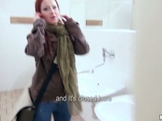 Kinky slut Belinda sucks a cock in the public toilet for money