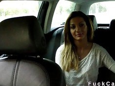 Busty amateur has sex in fake taxi